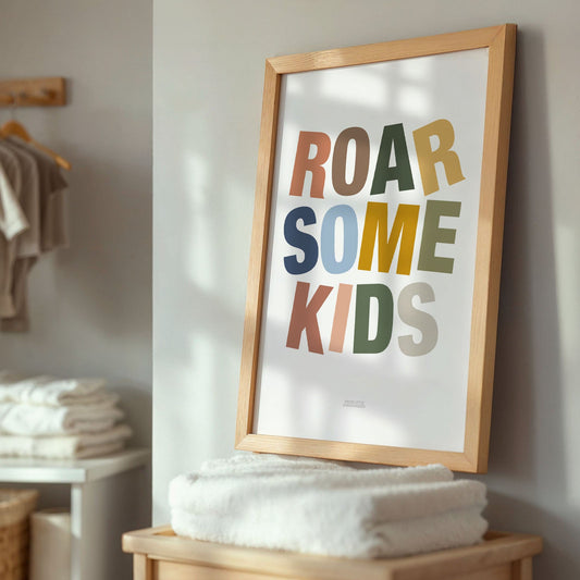 Framed poster with 'ROAR SOME KIDS' text in a home setting